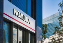 Bank chief takes pay cut after employee charged with attempted murder