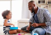 Government under fire over delay of better-paid paternity leave